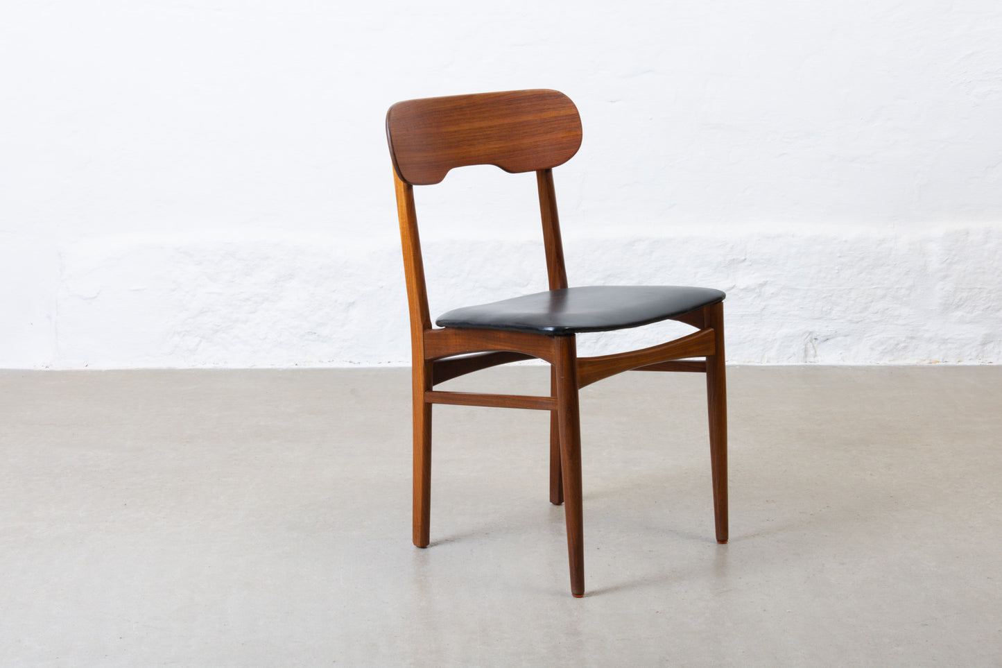 Three available: 1960s teak + vinyl chairs