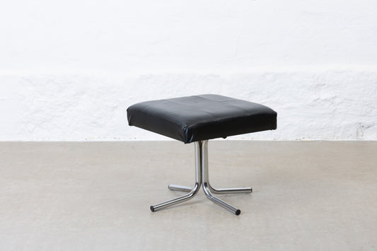 Vintage leather foot stool on metal base