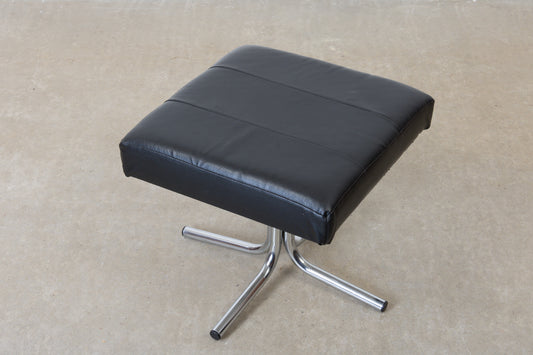 Vintage leather foot stool on metal base