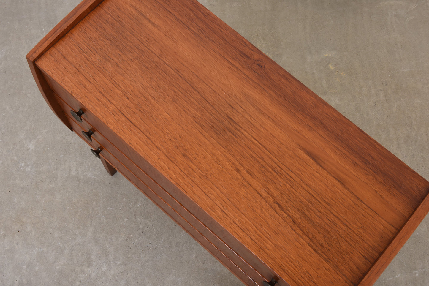 1960s low teak chest with brass handles