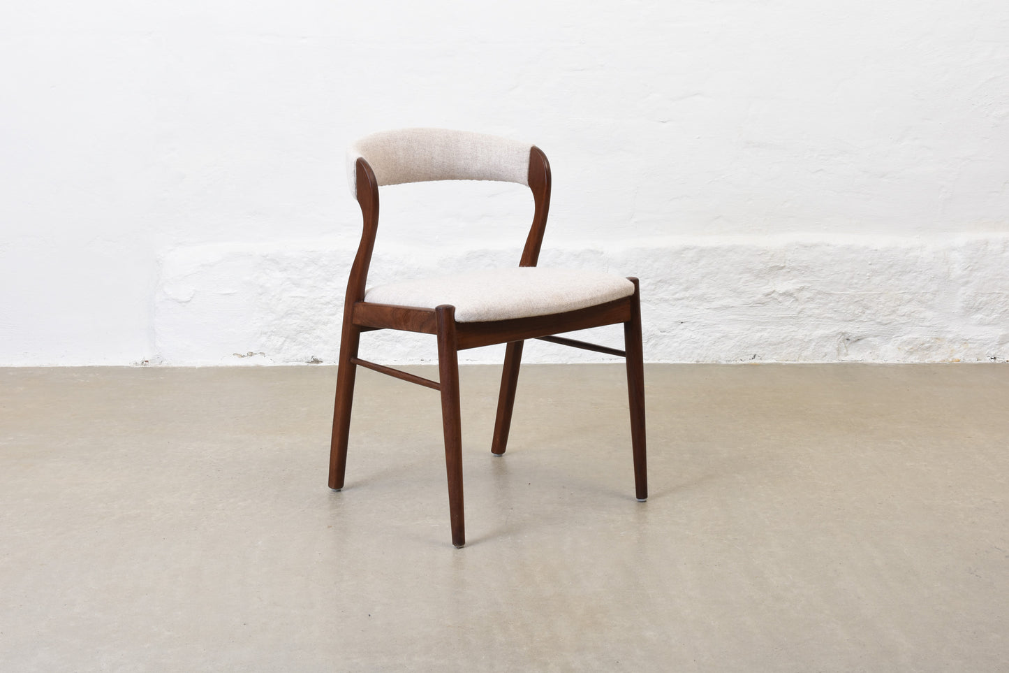 Newly reupholstered: 1950s teak + felt chair