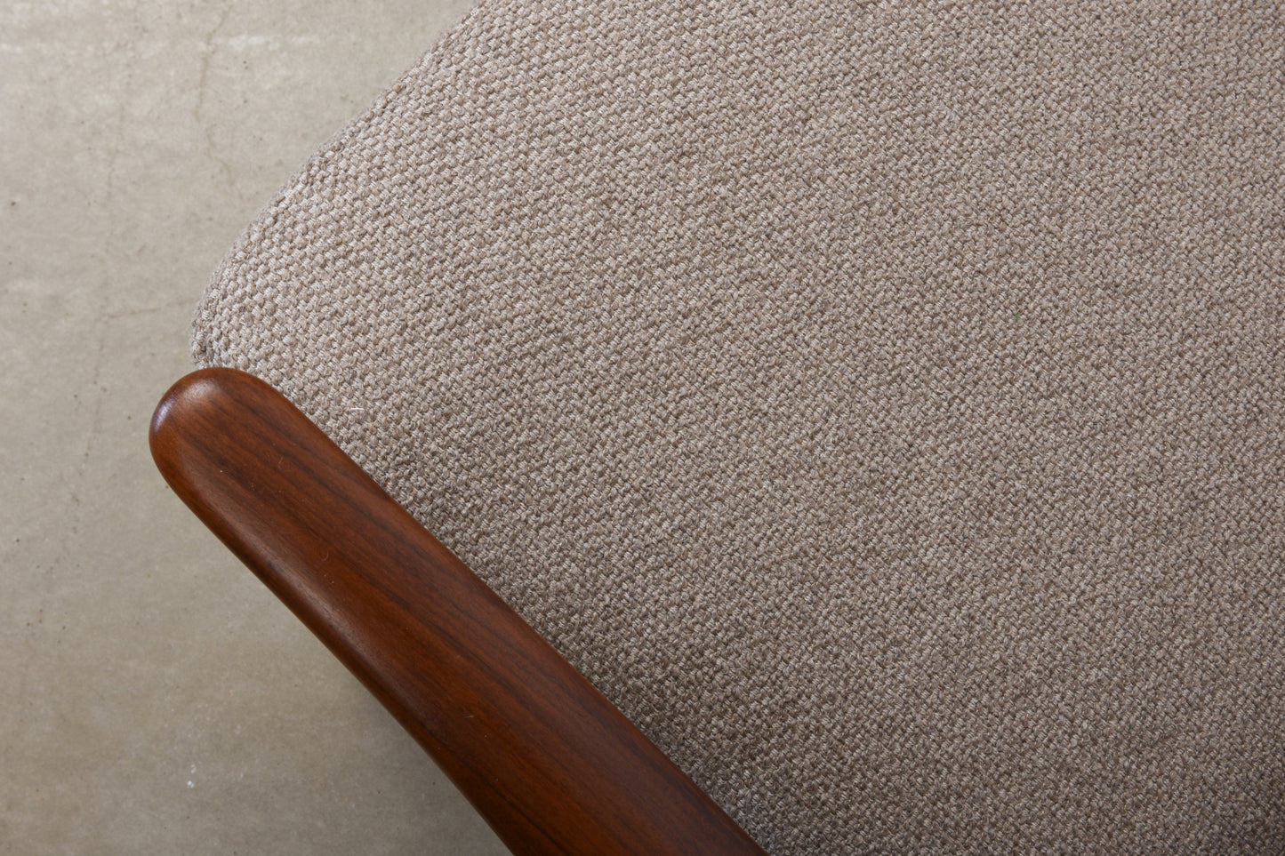 Newly reupholstered: 1950s teak + oak lounge chair