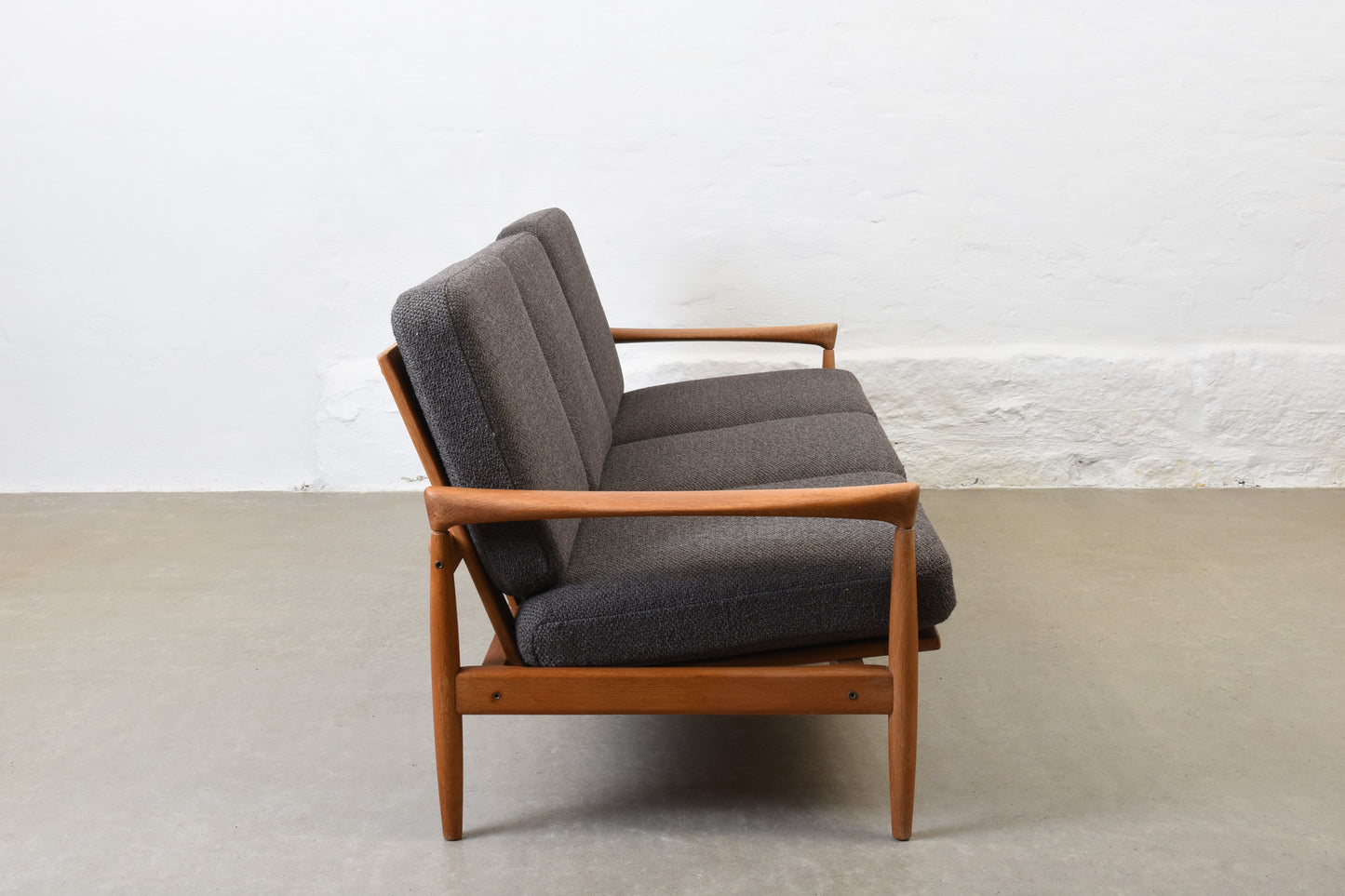 30% off: Newly reupholstered 1960s oak sofa by Erik Wørts