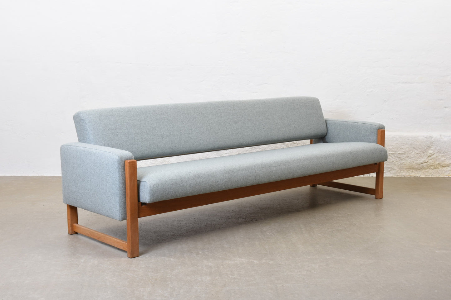 Newly reupholstered: 1960s oak sofa bed by Yngve Ekström