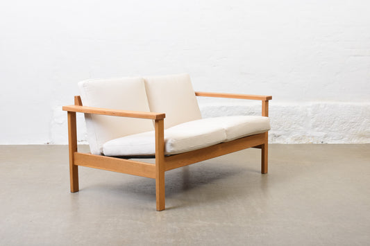 Newly reupholstered: 1960s oak + canvas two seater