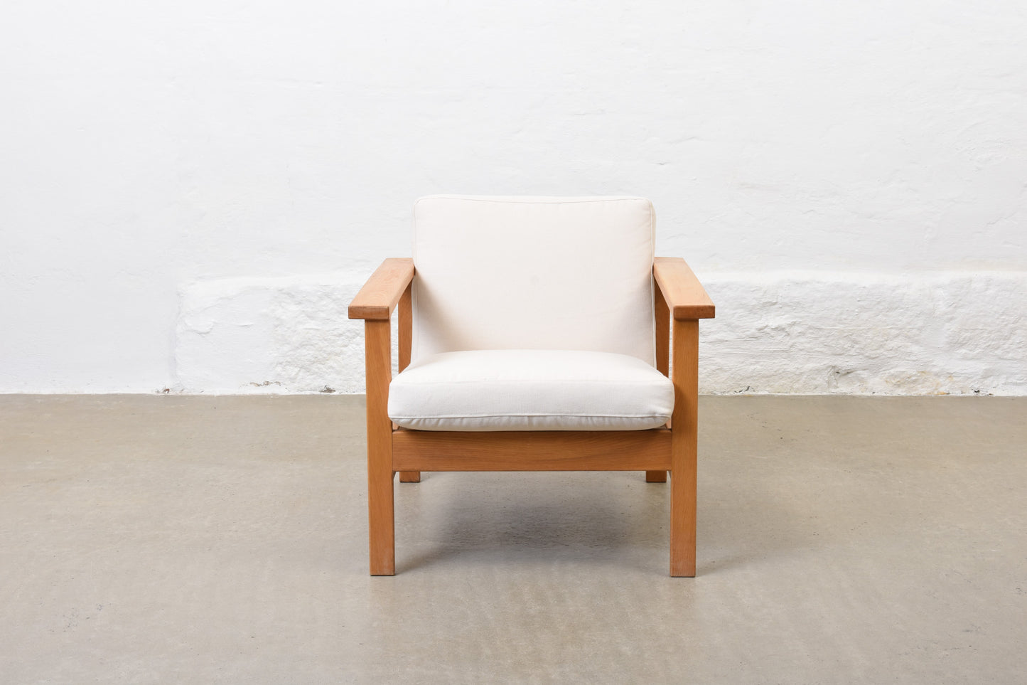 Newly reupholstered: 1960s oak + canvas lounger