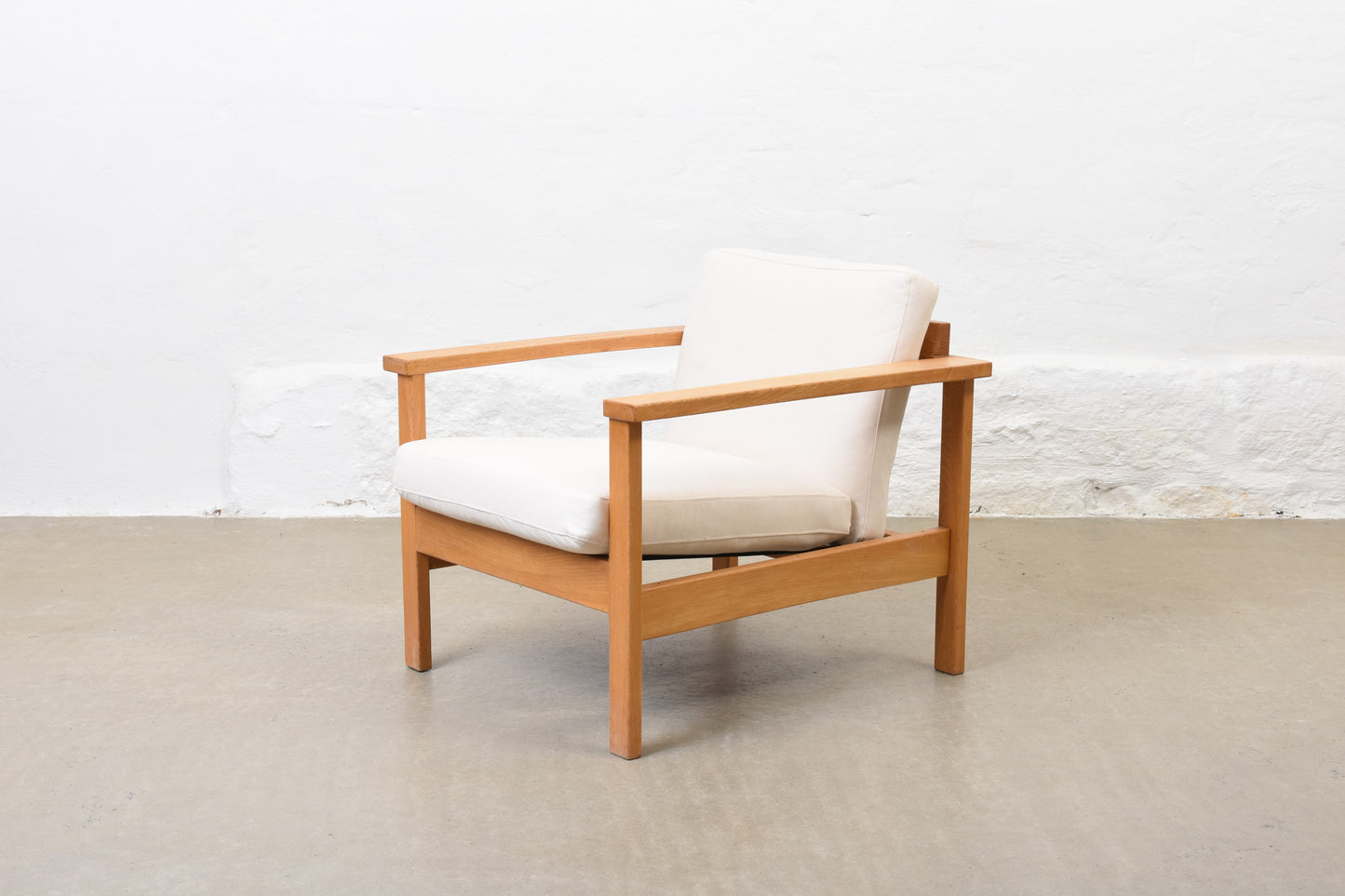 Newly reupholstered: 1960s oak + canvas lounger