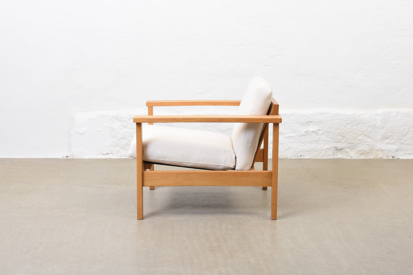 Newly reupholstered: 1960s oak + canvas lounger