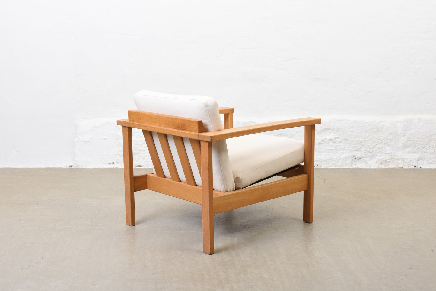 Newly reupholstered: 1960s oak + canvas lounger