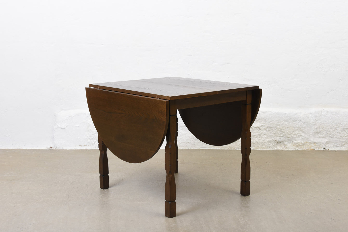 1960s drop-leaf dining table in oak by Henning Kjærnulf