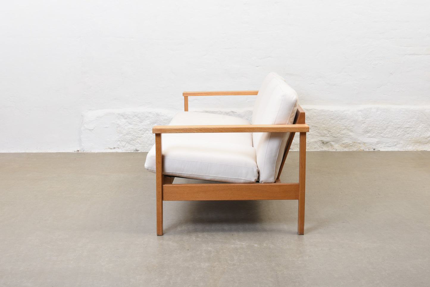 Newly reupholstered: 1960s oak + canvas three seater