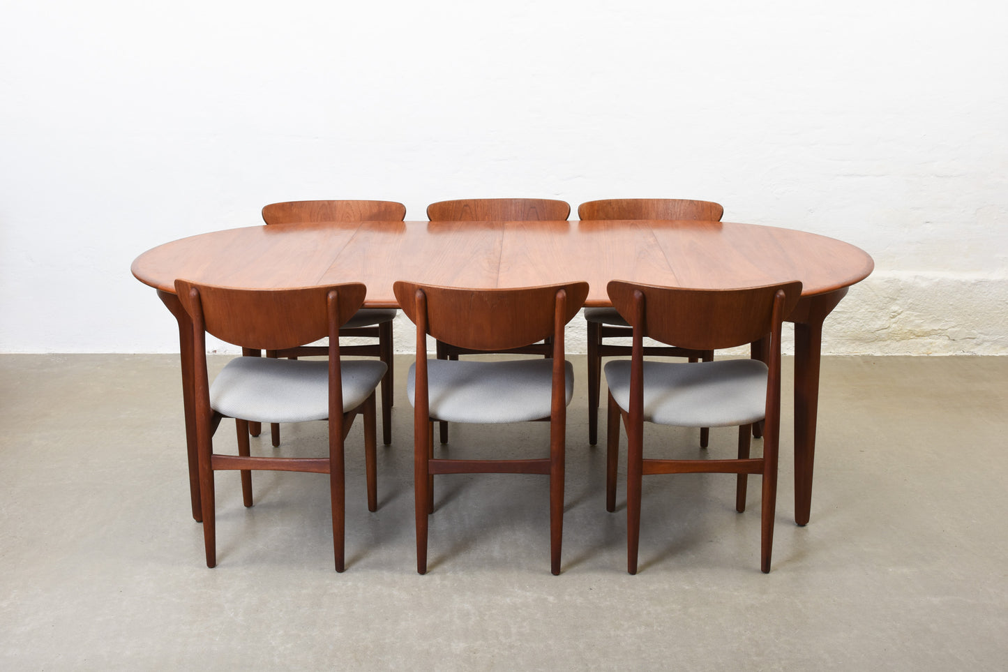 Newly reupholstered: Set of 1950s teak dining chairs by Henning Kjærnulf