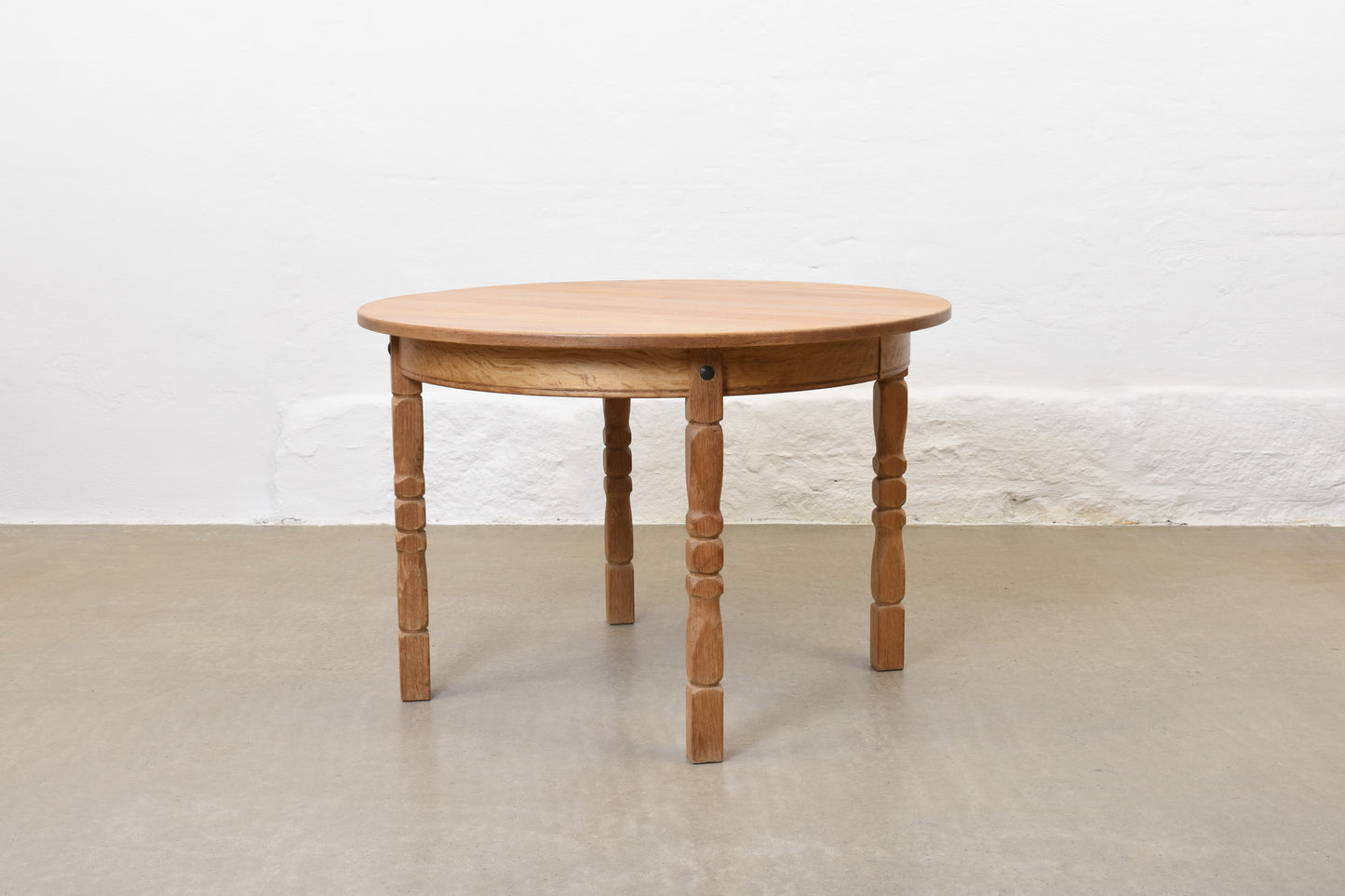 1970s extending oak dining table by Henning Kjærnulf