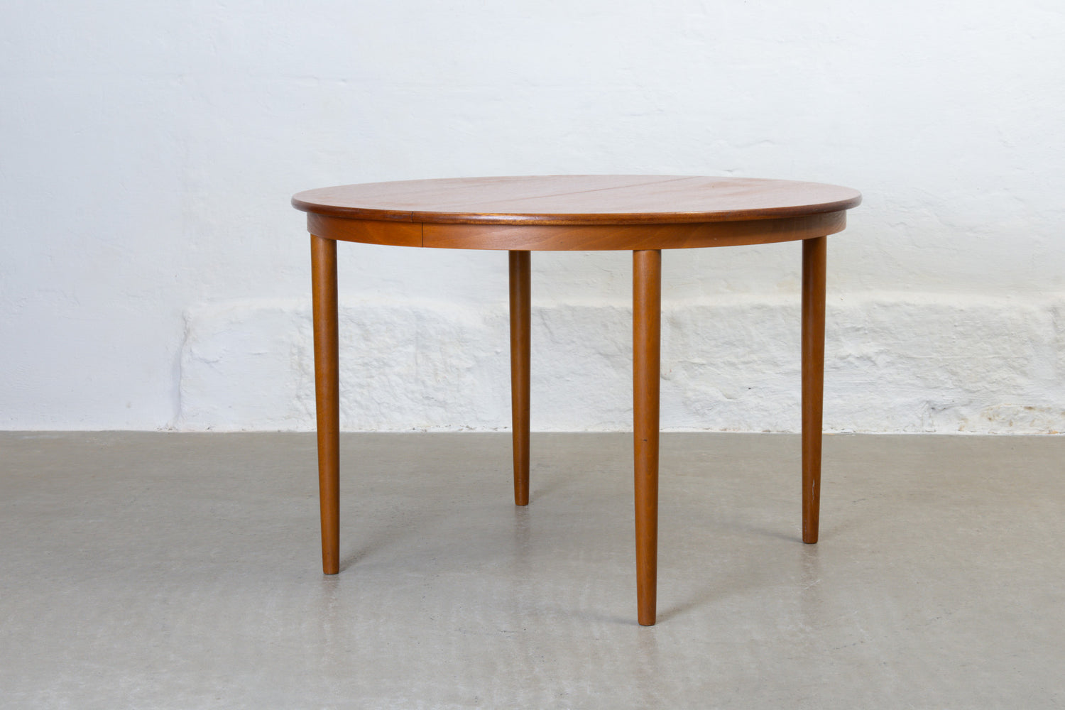 1960s extending dining table in teak -110D cm
