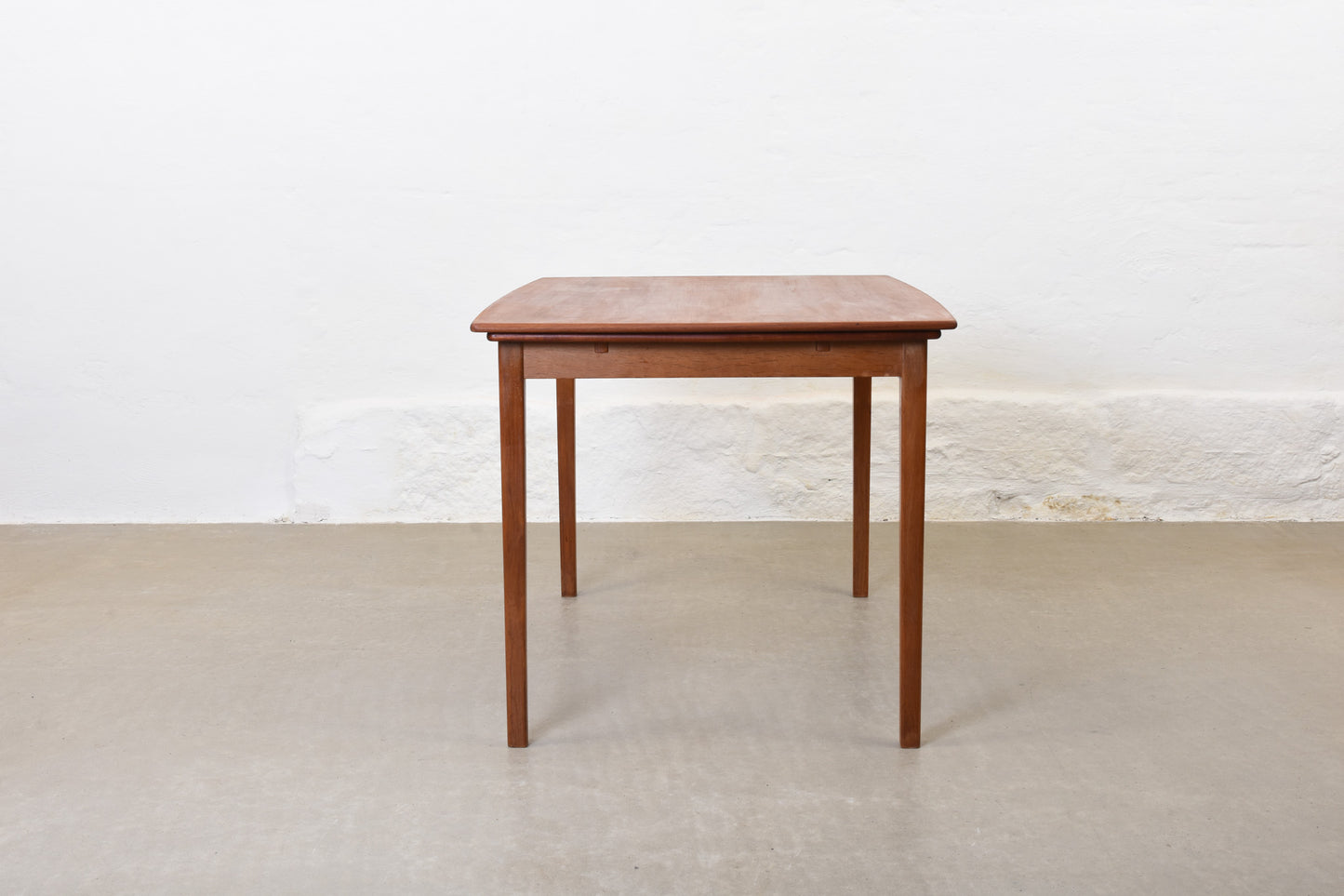 1960s boat-shaped dining table in teak