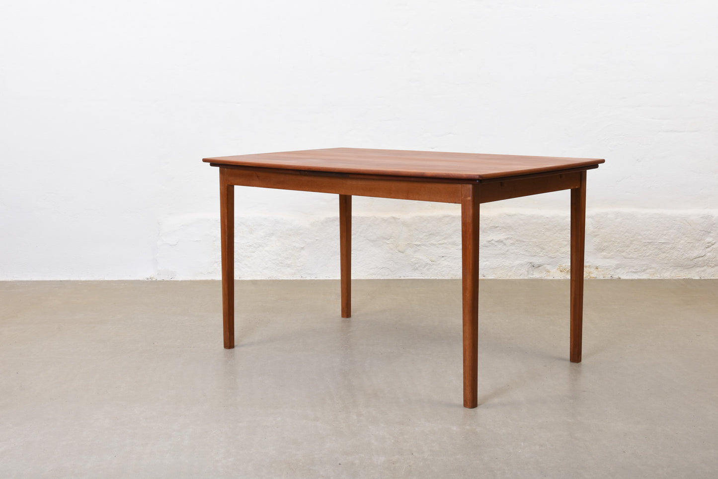 1960s boat-shaped dining table in teak