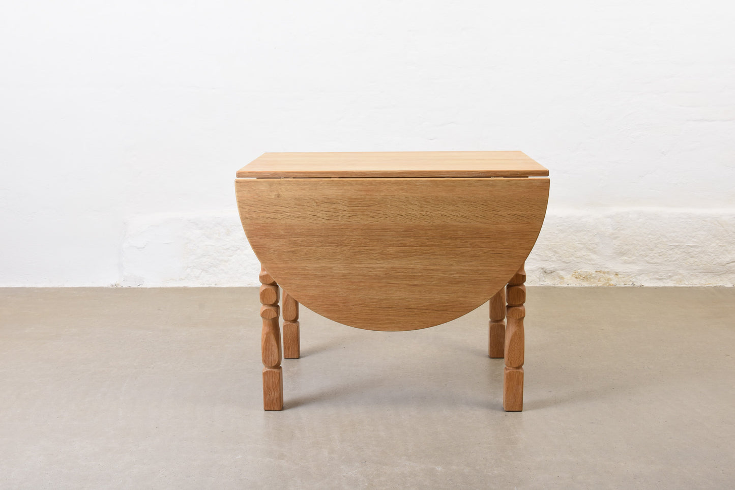1960s drop leaf dining table in oak by Henning Kjærnulf