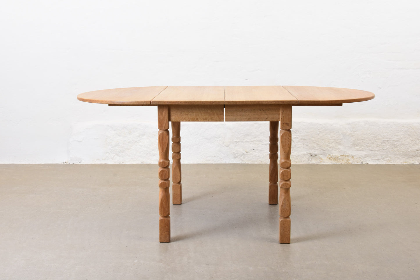 1960s drop leaf dining table in oak by Henning Kjærnulf