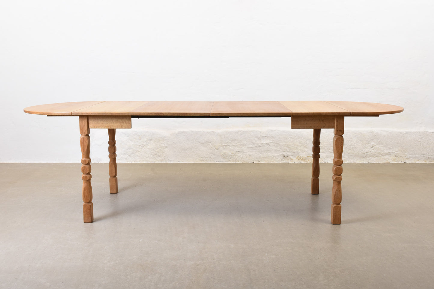 1960s drop leaf dining table in oak by Henning Kjærnulf