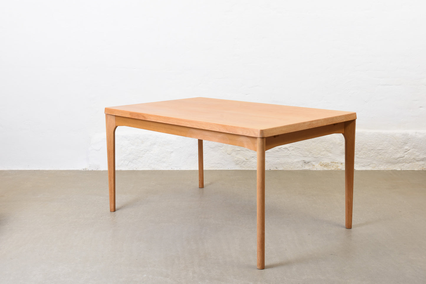 1960s extending oak dining table by Henning Kjærnulf