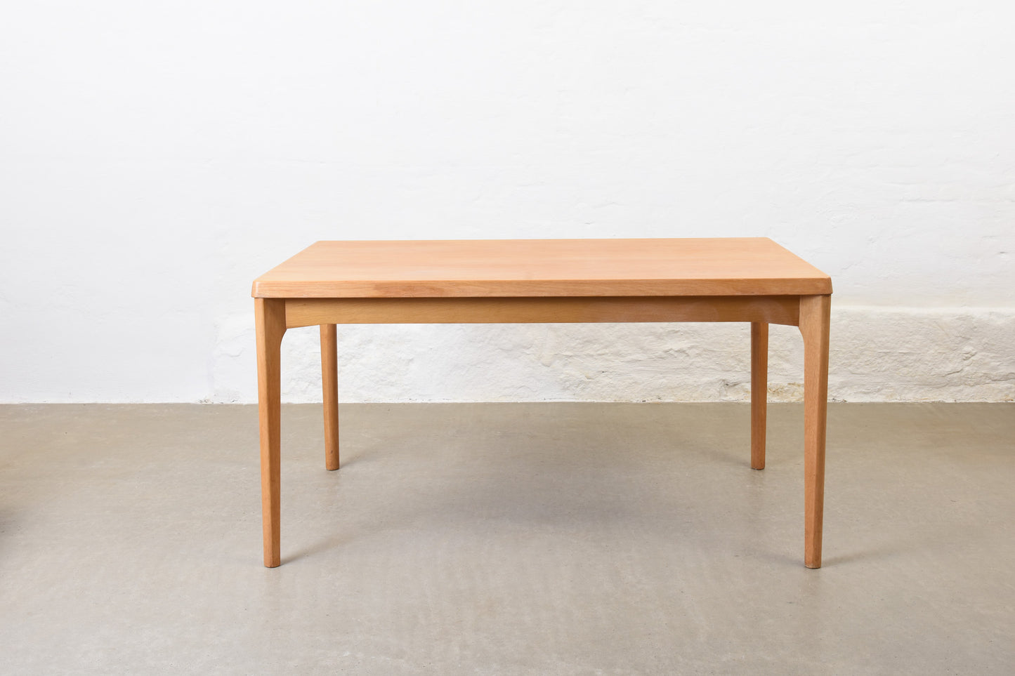 1960s extending oak dining table by Henning Kjærnulf