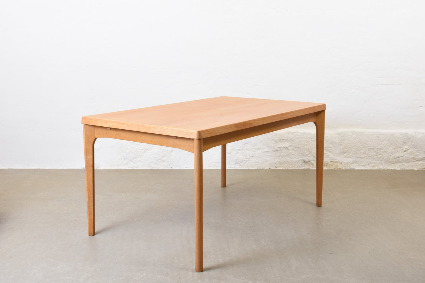 1960s extending oak dining table by Henning Kjærnulf