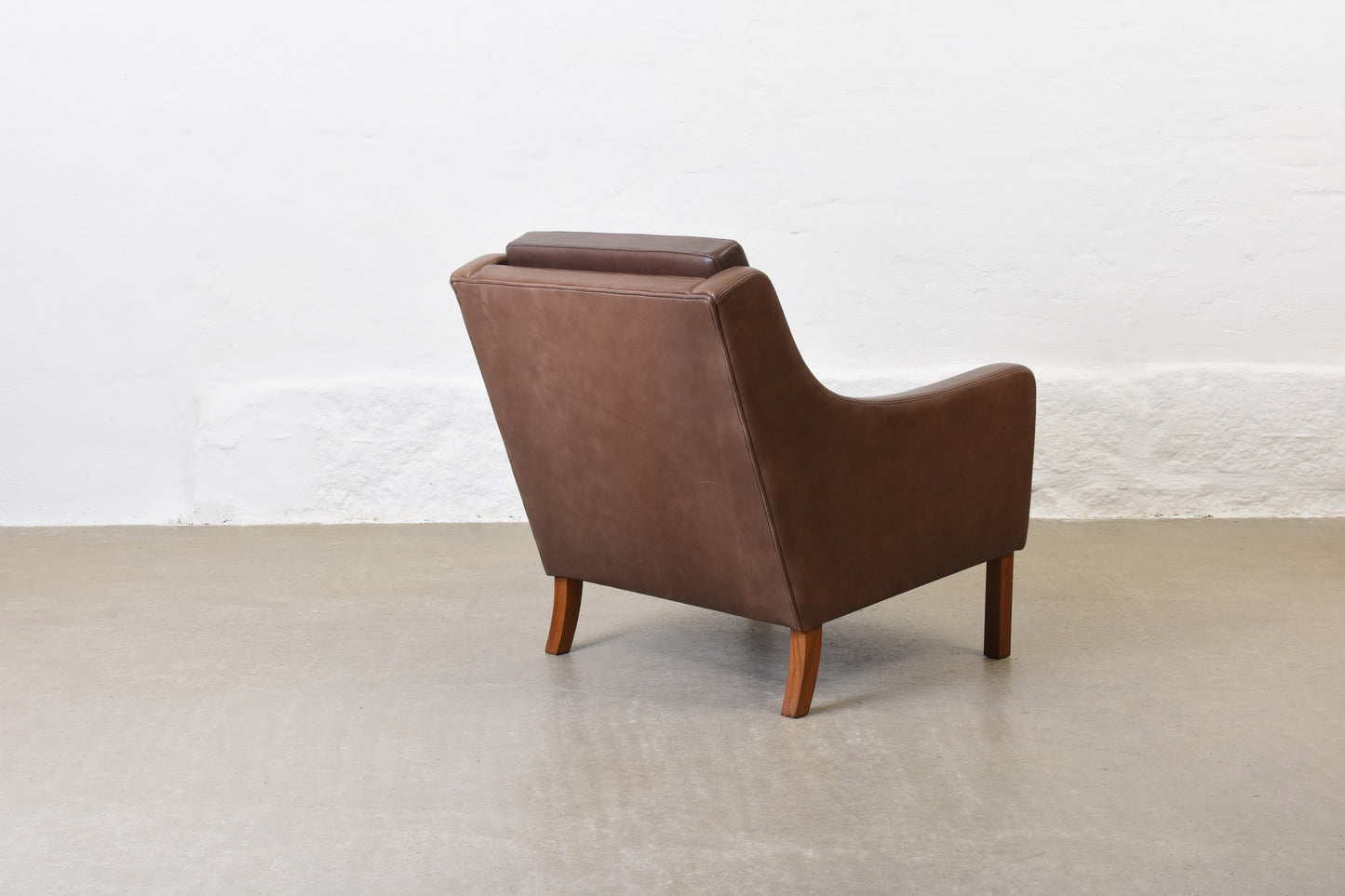 20% off: 1960s leather club chair on rosewood legs