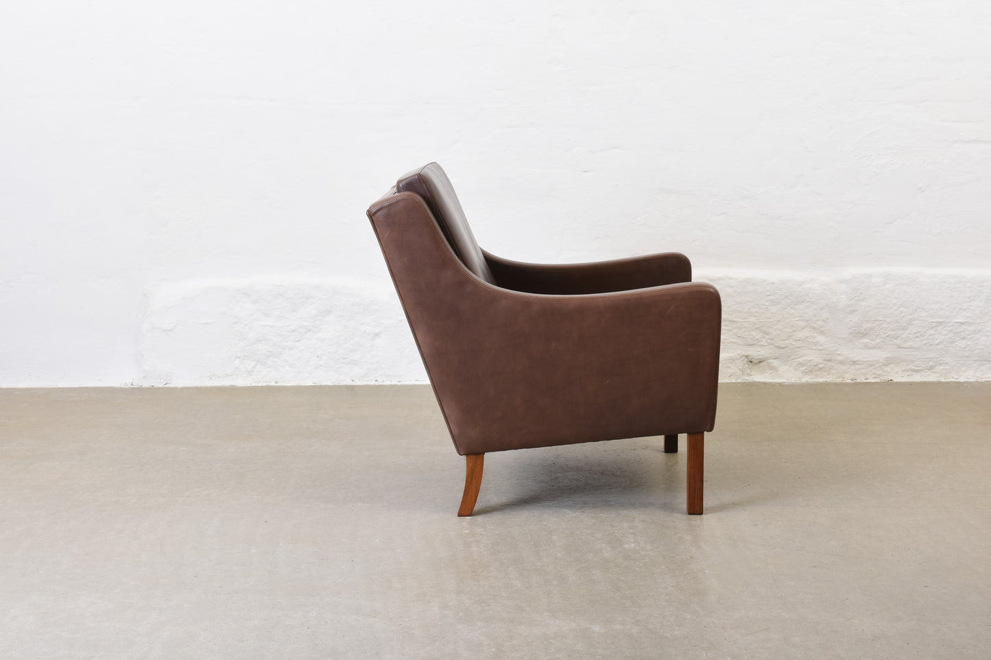 20% off: 1960s leather club chair on rosewood legs