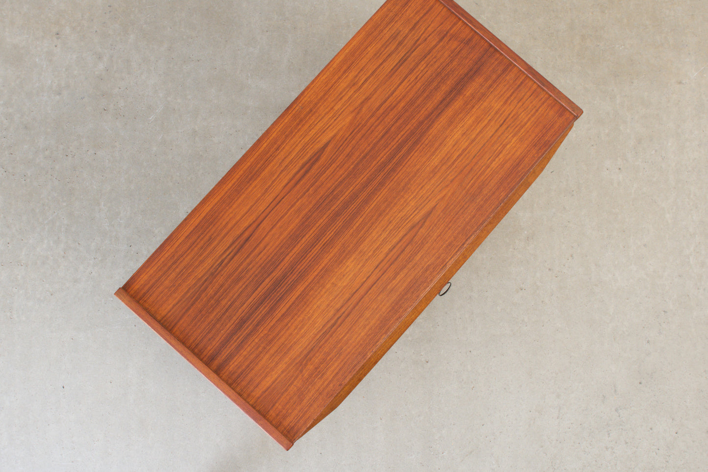 1960s low teak chest of three drawers