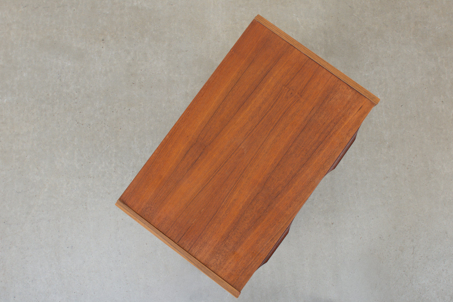1960s low teak chest of four drawers