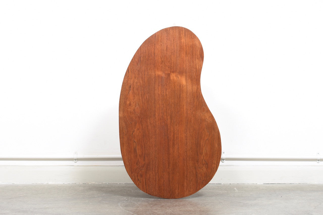 Organic side table in teak