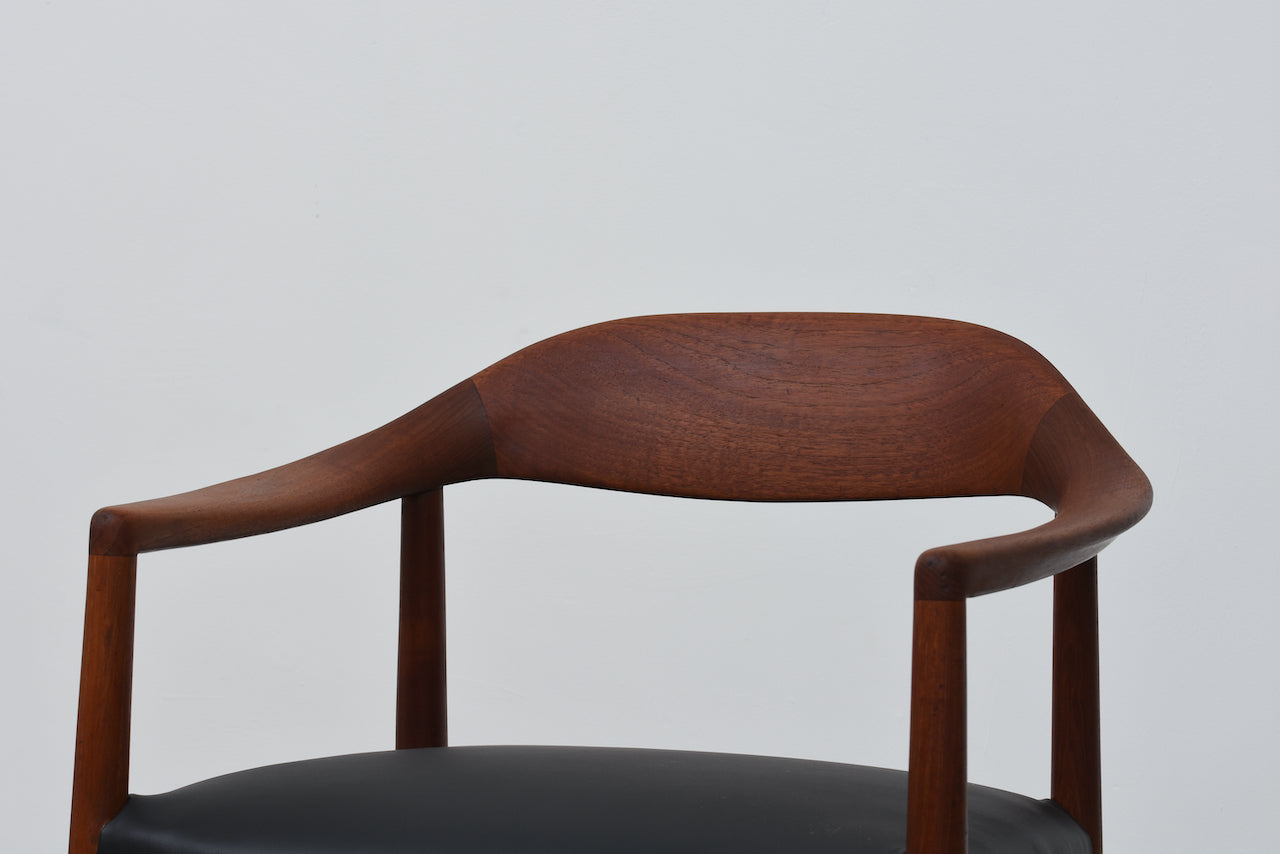 1960s teak armchair with curved back