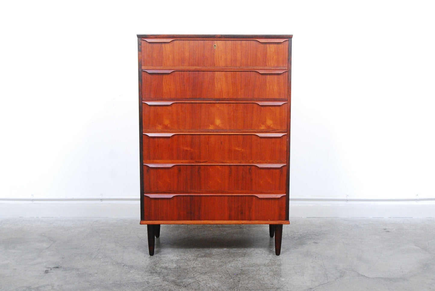 Large rosewood chest of drawers