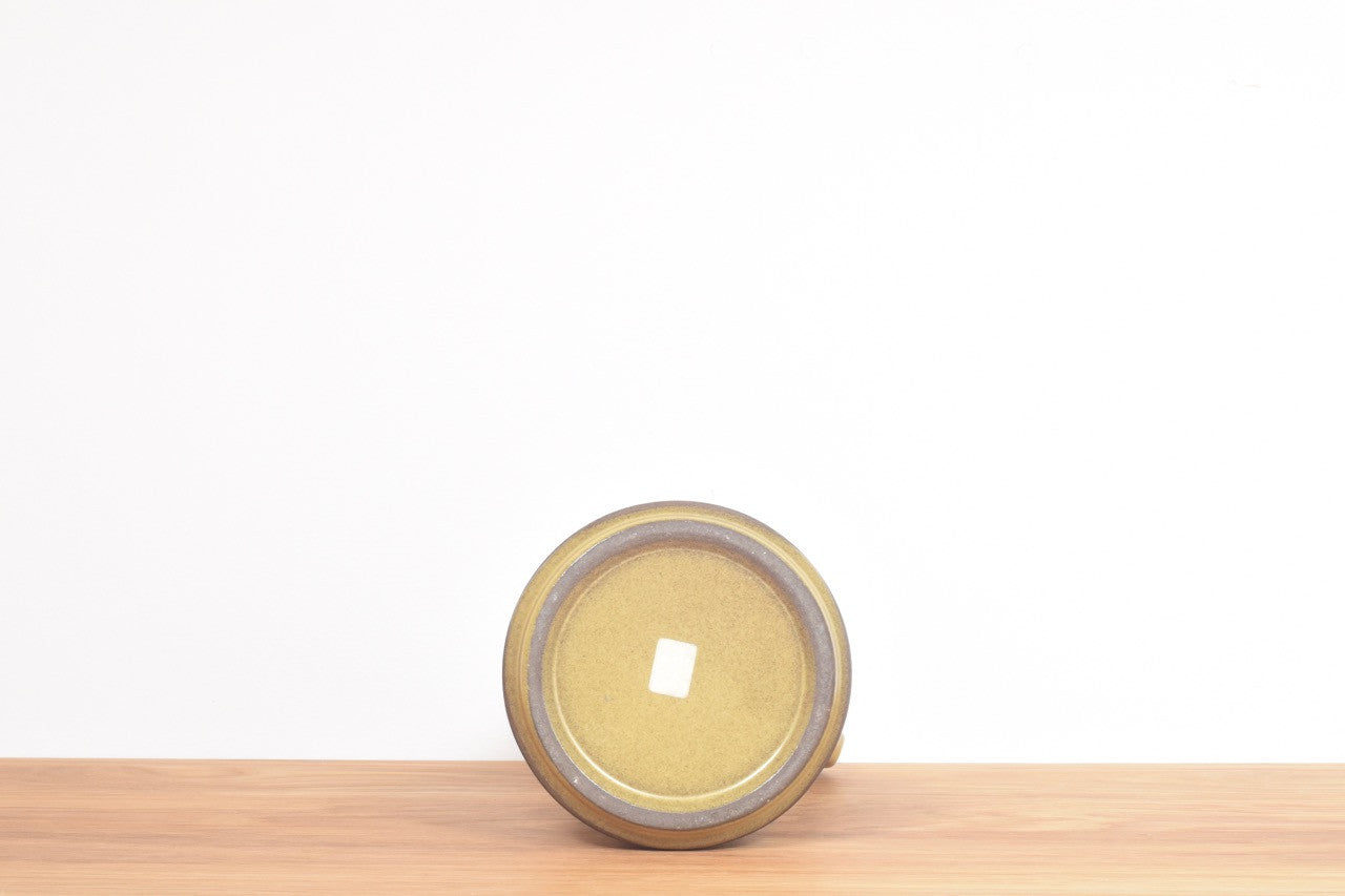 Ceramic pitcher with mustard glaze