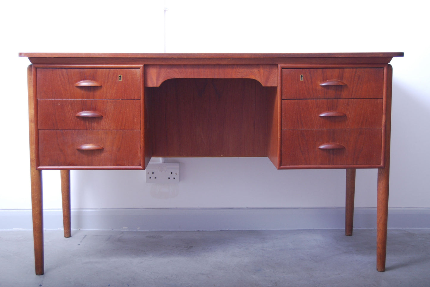 Teak desk w/ six drawers