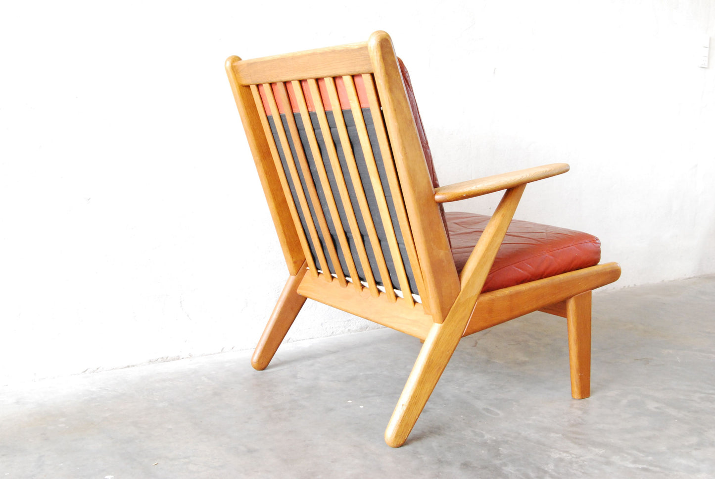 Pair of oak lounge chairs by Poul Volther