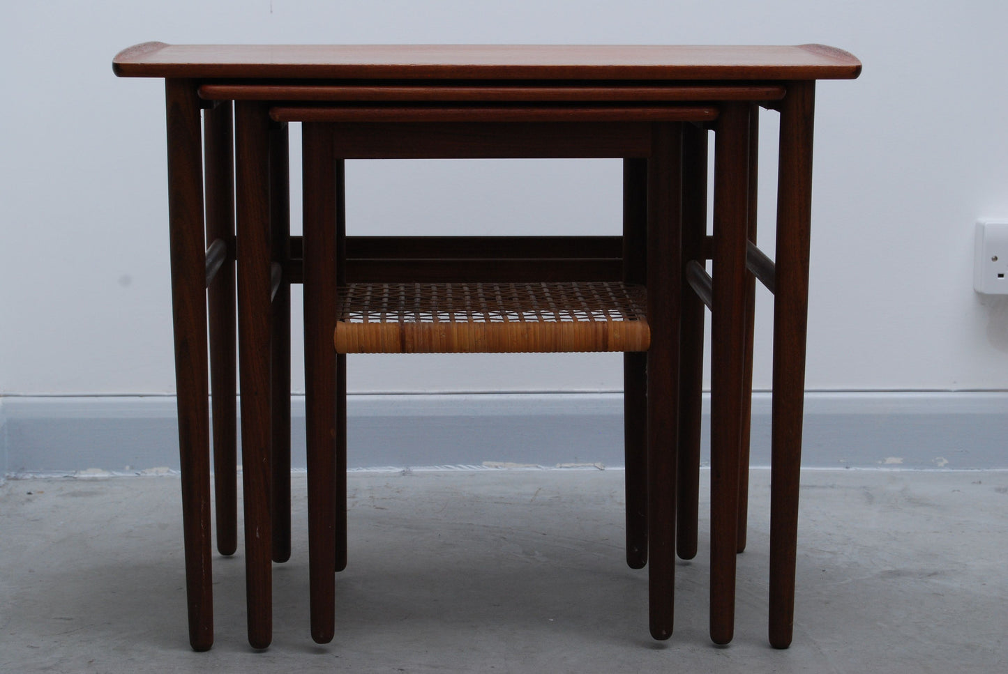 Nest of three tables in teak