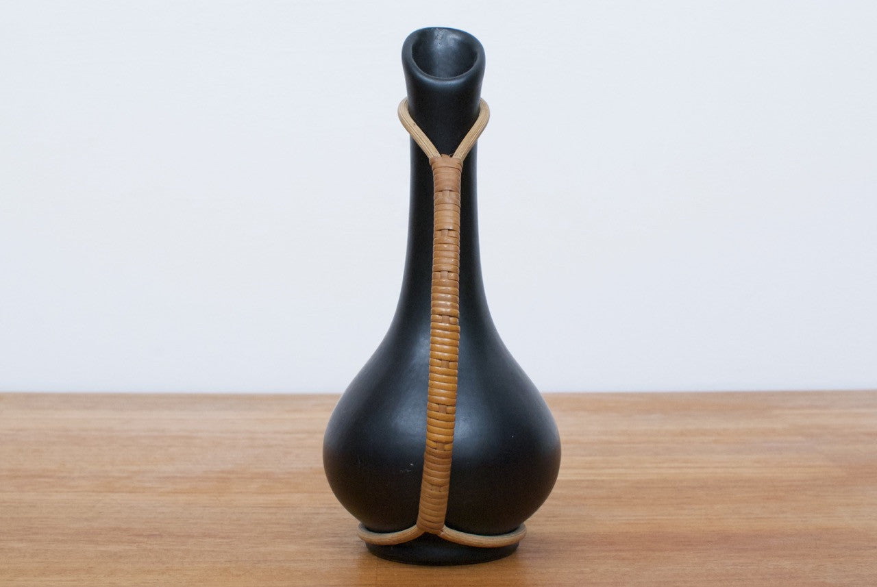 Black ceramic bud vase with cane handle