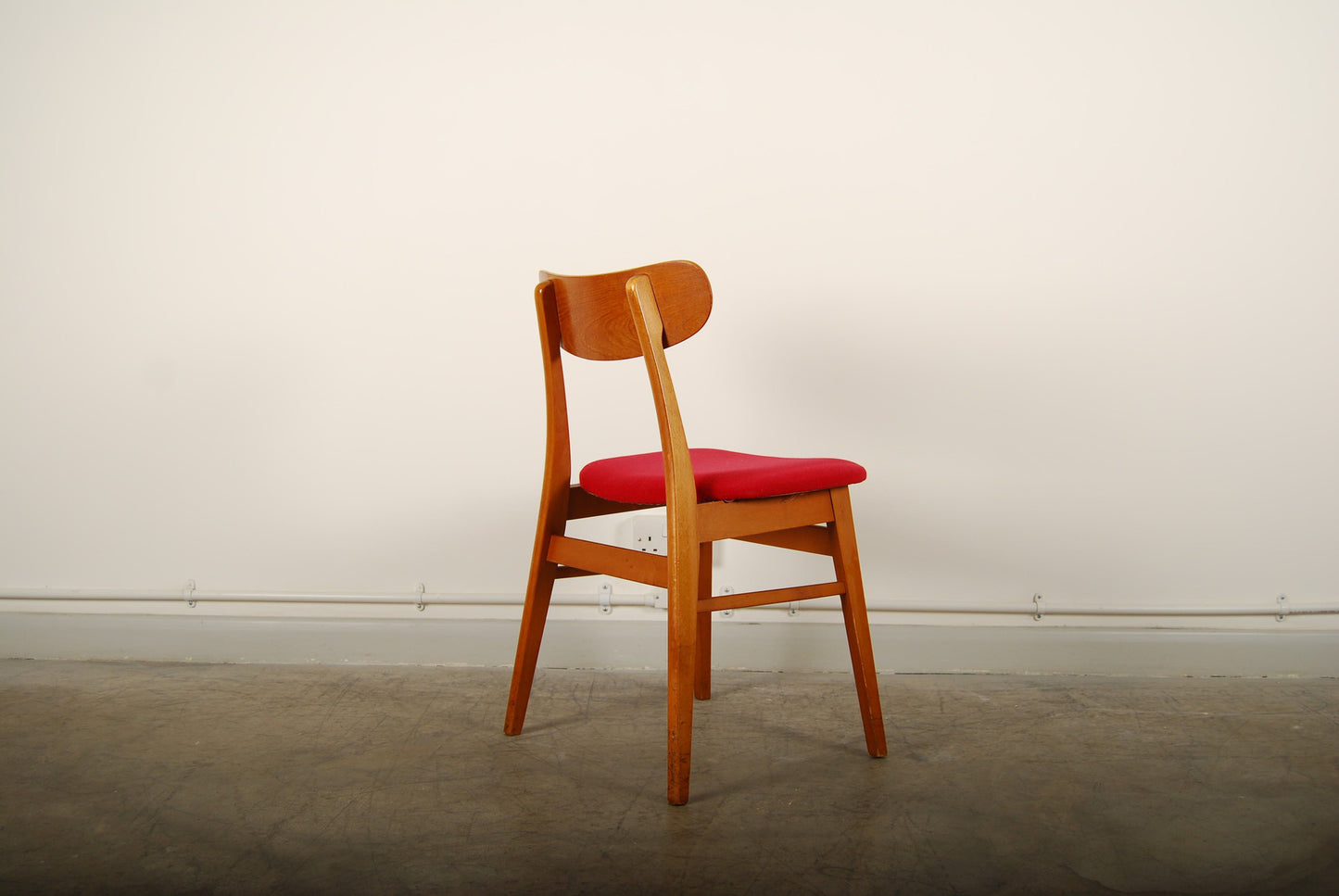 Set of four teak and beech dining chairs