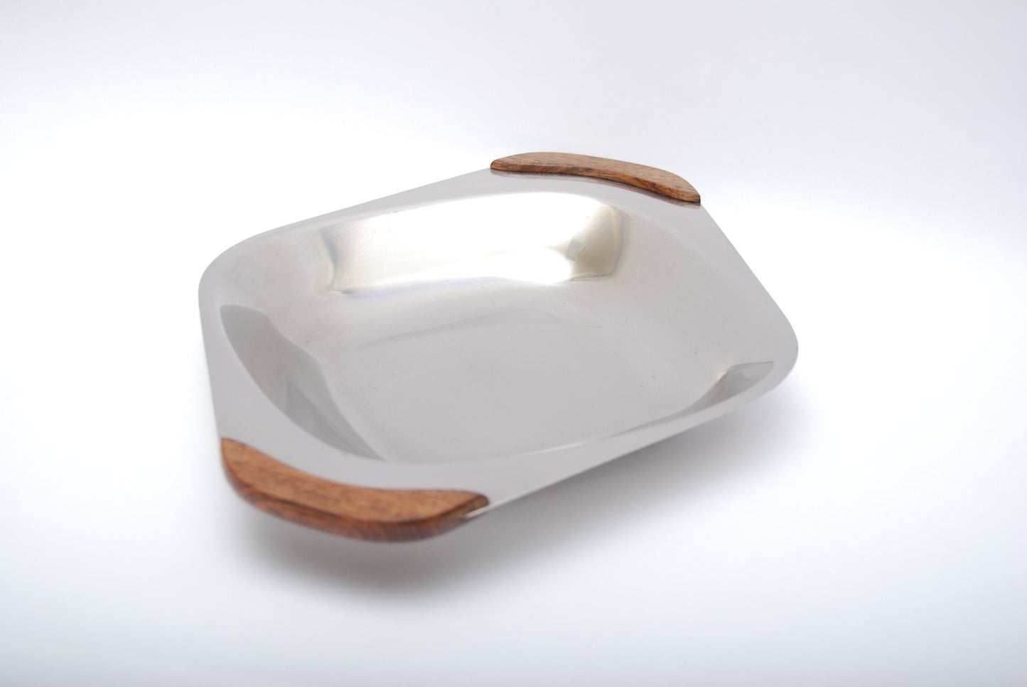 Stainless steel dish with rosewood handles