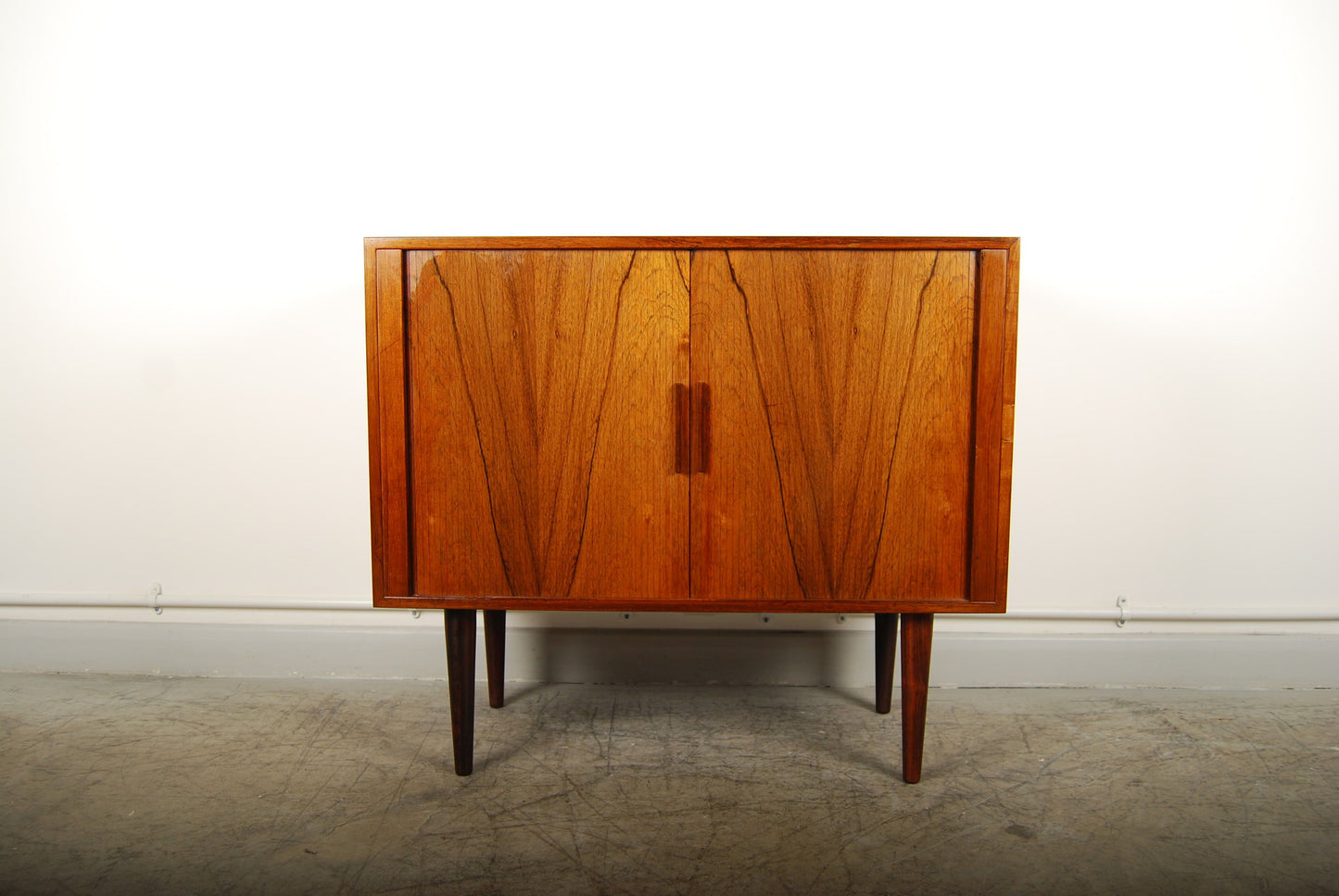 Rosewood short sideboard with tambour doors
