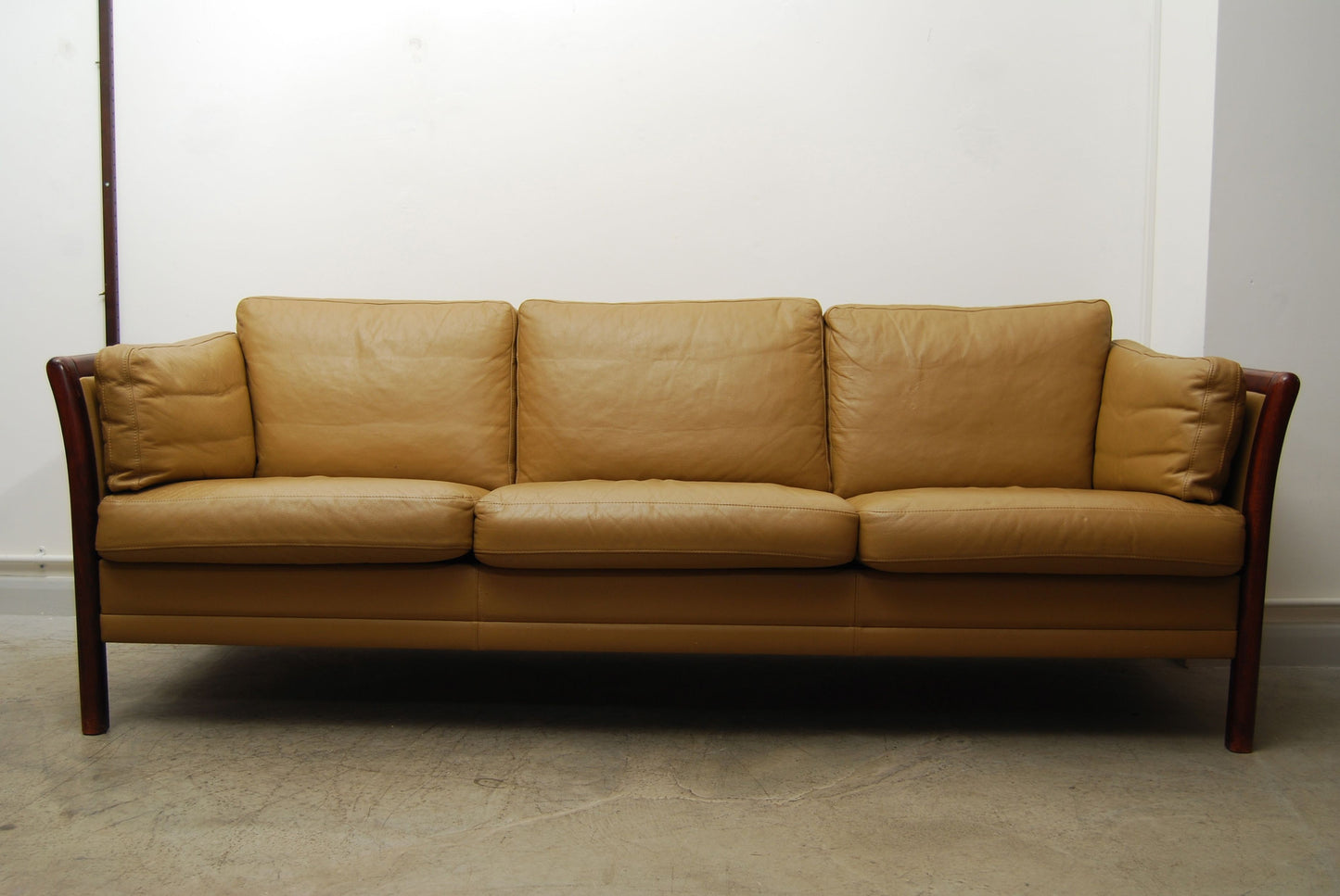 Three seat leather sofa by Stouby