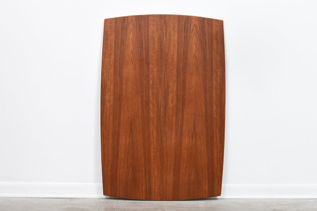 Extending rectangular dining table in teak