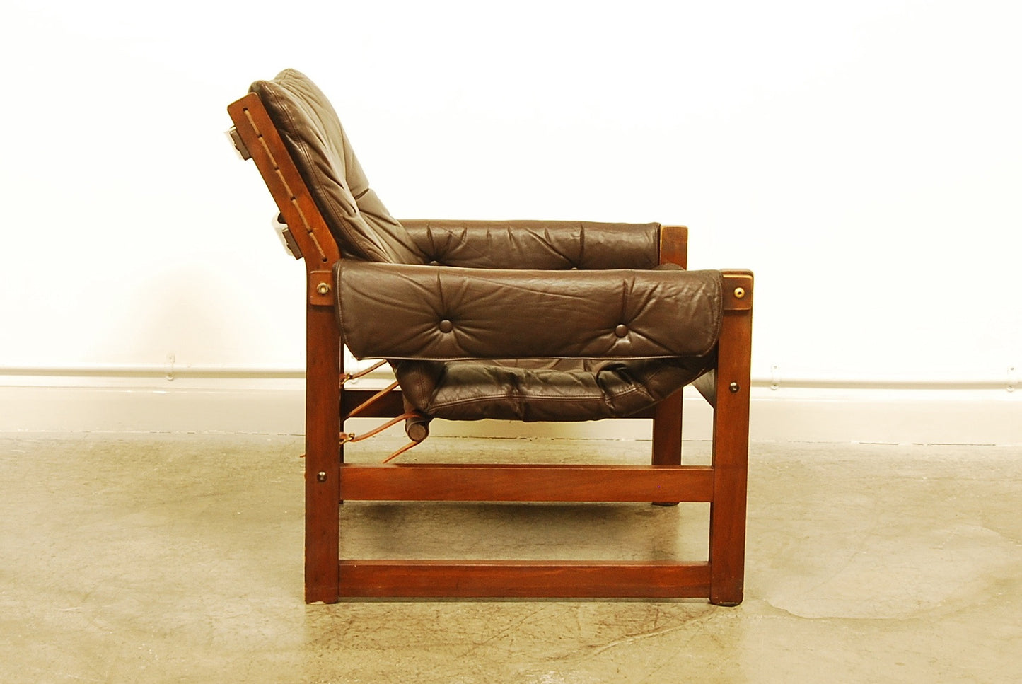 Pair of stained beech lounge chairs