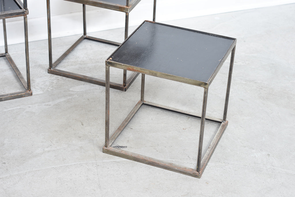 One left: Welded steel stacking tables