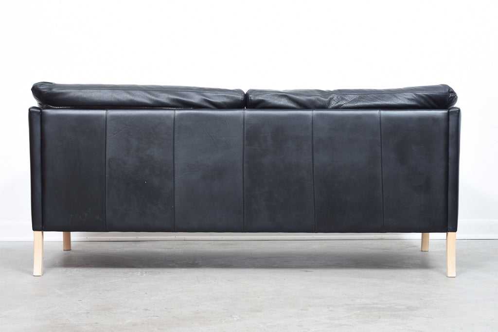 Two and a half seat leather sofa by Stouby