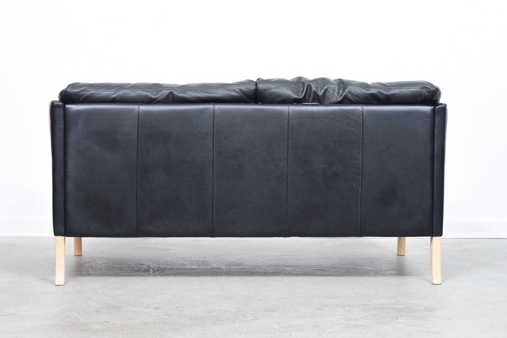 Two seat leather sofa by Stouby