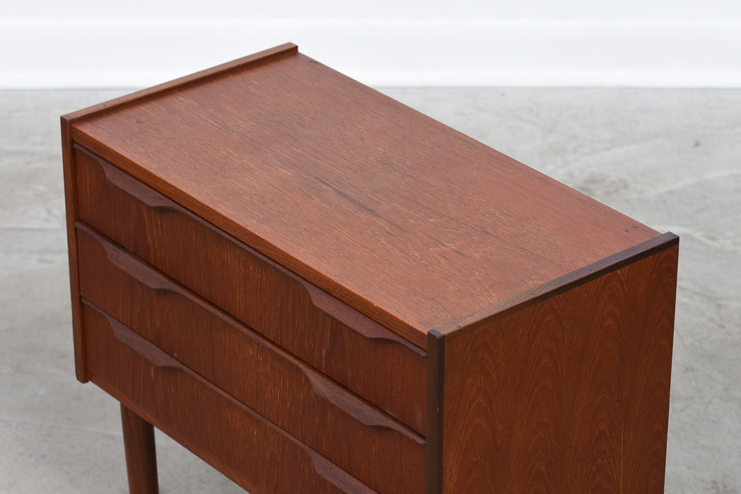 Short chest of three drawers in teak