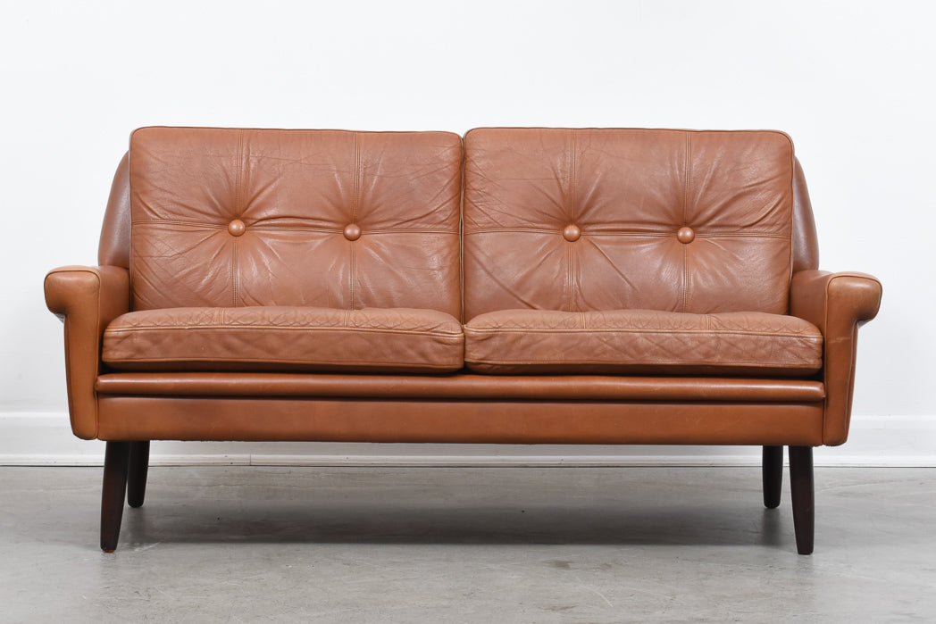 Two seat leather sofa by Svend Skipper