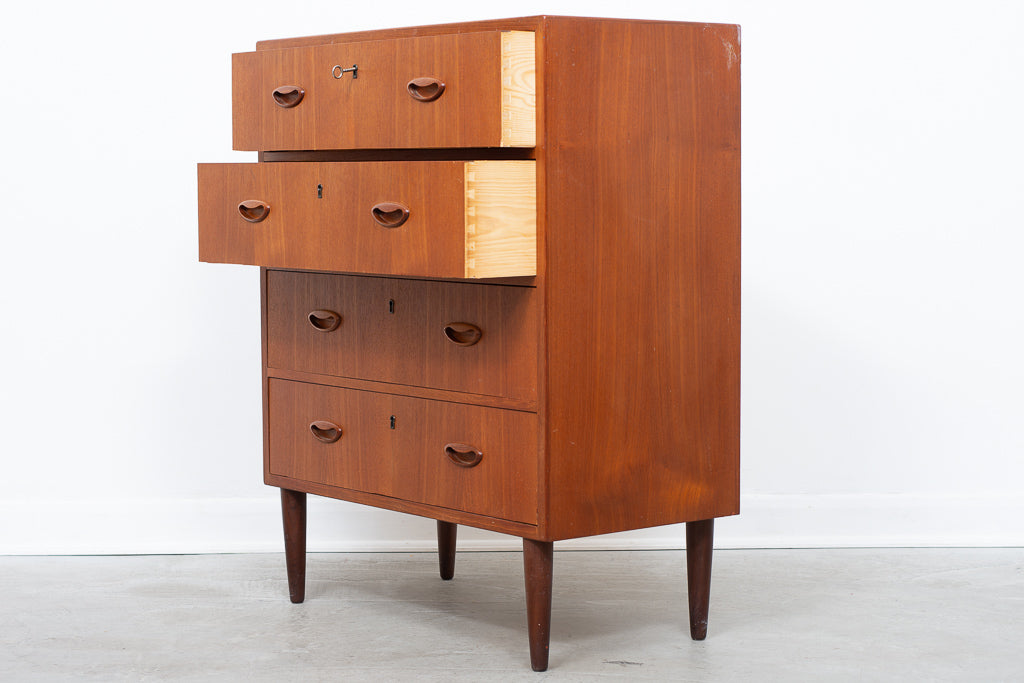 Teak chest of four drawers